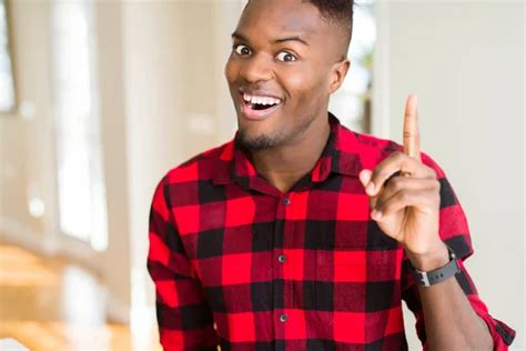 Handsome African American Man Pointing Finger Up With Successful Idea Exited And Happy Number