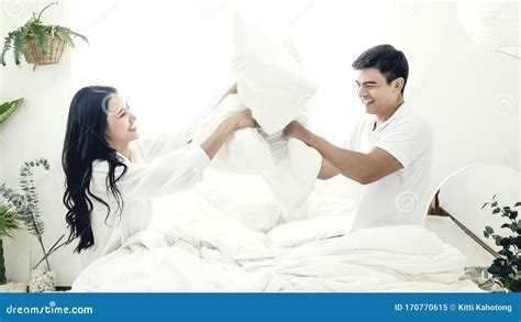 Young Couple Teasing Each Other In The Bedroom Stock Image Image Of Romance Happiness 170770615