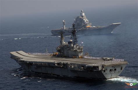 Two Gray Cargo Ships Military Ship Ins Vikramaditya Ins Viraat R