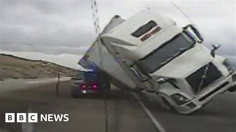 Strong Winds In Us Topple Truck On Highway Bbc News