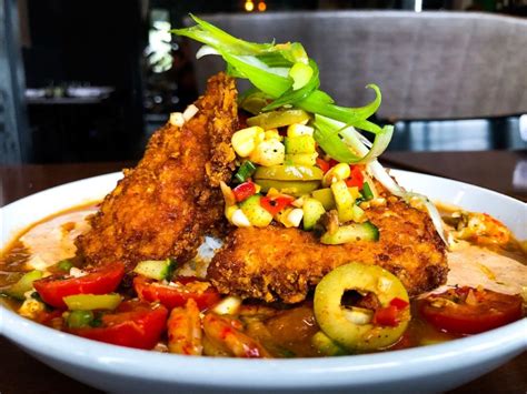 Feast Weekend Special Cajun Fried Alligator And Miraflors Blanc