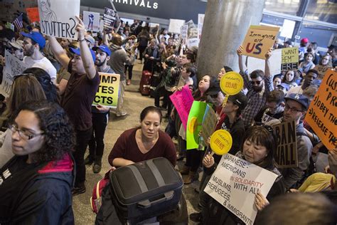 Protesters block LAX traffic, face off with police as they rally ...