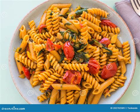 Whole Grain Pasta Dish With Tomatoes And Rocket Stock Image Image Of