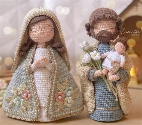 Two Crocheted Nativity Figurines With Flowers