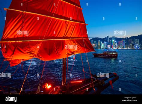 HONG KONG JANUARY 25 2016 The Red Sails Of Aqua Luna At Twilight