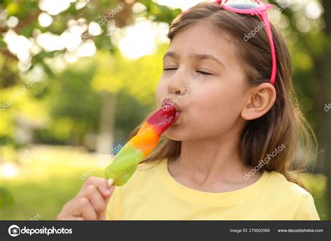 Girl Sucking Popsicle