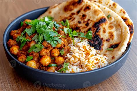 chana masala  basmati rice  naan bread   bowl  stock