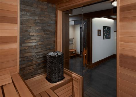 Custom Finnleo Sauna With Himalaya Heater And Stone Wall Modern