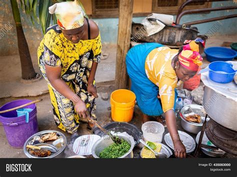 African Woman Cooking