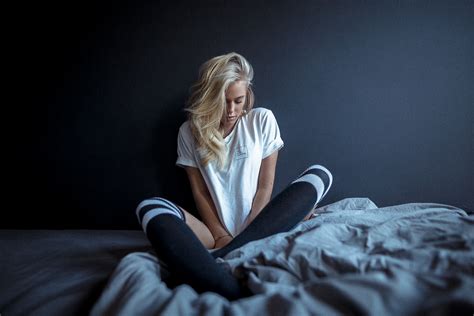 Women Model Blonde T Shirt Sitting In Bed Knee Highs Dark Background