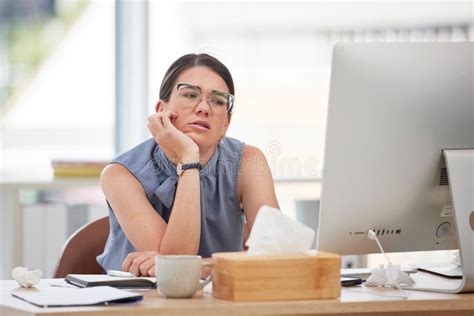 Bored Burnout And A Business Woman Using A Computer At Work While Feeling Annoyed Or Frustrated