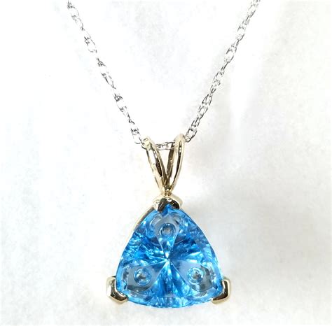 Blue Topaz Specialty Trillion Cut Gemstone By Thomas Trozzo In 14K