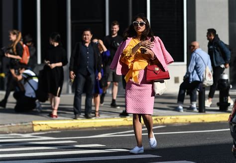 If you own a red purse, consider wearing it with an all-pink outfit ...