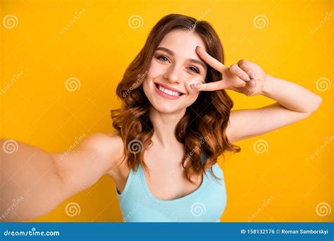 Photo Of Lady Making Selfies For Instagram Blog Showing V Sign Near Eye