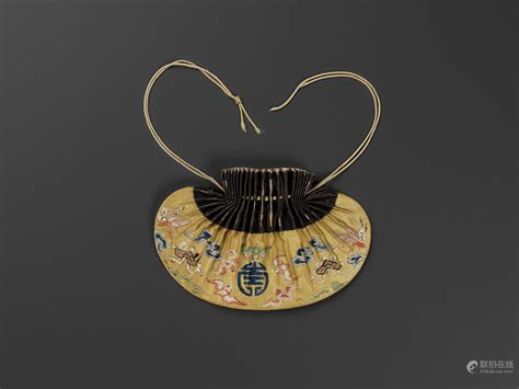 Bidlive An Embroidered Yellow Silk Pouch Late Qing Dynasty