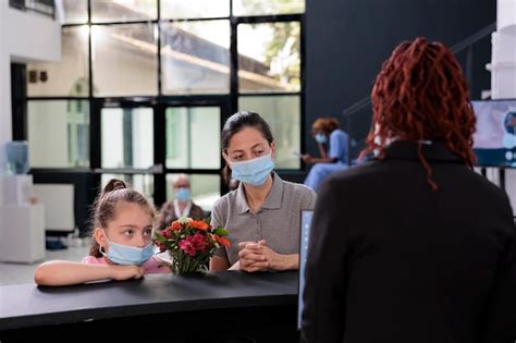 Premium Photo | Mother and child wearing protective face mask against ...