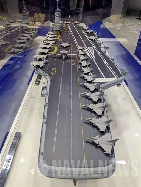 A Model Of An Aircraft Carrier On Display