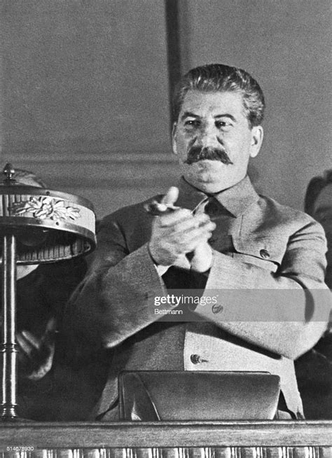 Stalin Applauds A Speaker Discussing Stalins Report On The Draft Of