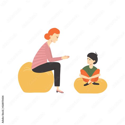 Child psychologist has conversation with boy. Family psychotherapy ...