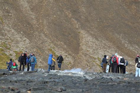 Tourists Climbs on Hot Lava in Iceland