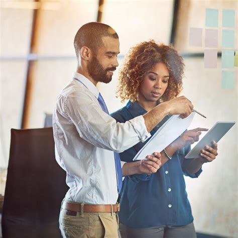 Premium Photo Planning Coworkers Or Brainstorming On Tablet In Modern