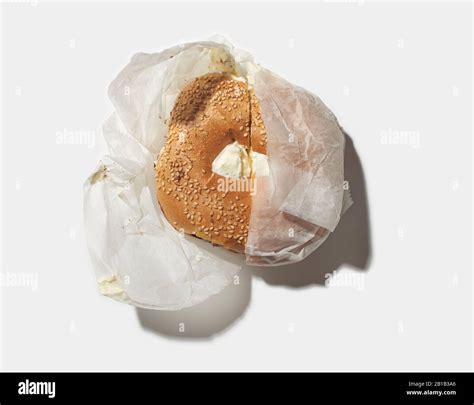 Toasted Sesame Bagel with cream cheese Stock Photo - Alamy