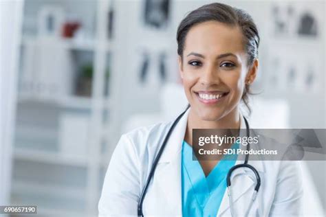female doctor  white coat stock  high res pictures