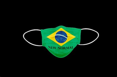 Novo Texto Normal Na Máscara Facial Com Bandeira Do Brasil Foto Premium