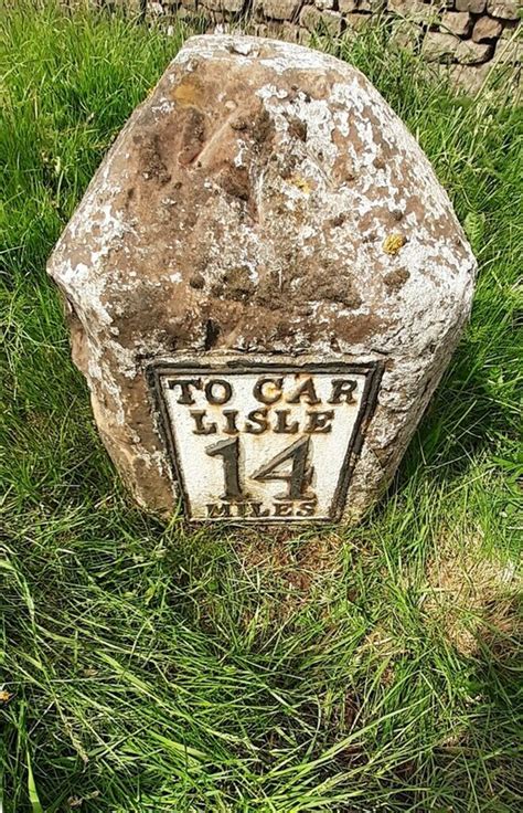 Milestone With Benchmark On North Side Roger Templeman Cc By Sa 2