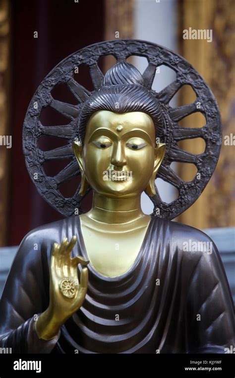 Buddha And Wheel Of Dharma Statue In A Chiang Mai Temple The Buddha S