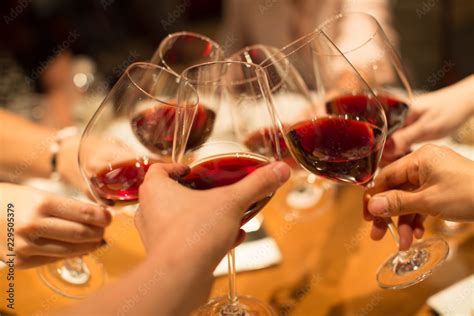 Group Of Friends Celebrating Toasting Wine Glasses Business Meeting Cheers Symbol Of