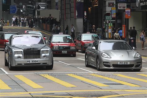 Rolls Royce Phantom Vs Porsche Panamera Normal Day In Cen Flickr