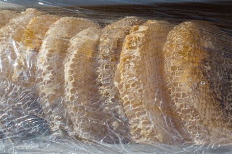 Premium Photo Fresh Honey In The Sealed Comb Frame