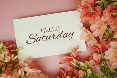 Hello Saturday Typography Text With Flowers On Pink Background Stock