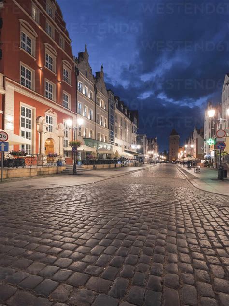 Poland Warmian Masurian Voivodeship Elblag Illuminated Cobblestone