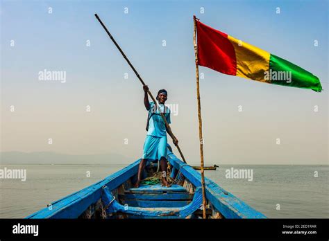 Guinean flag on a boat, Conakry, Republic of Guinea, Guinea Conakry Stock Photo - Alamy