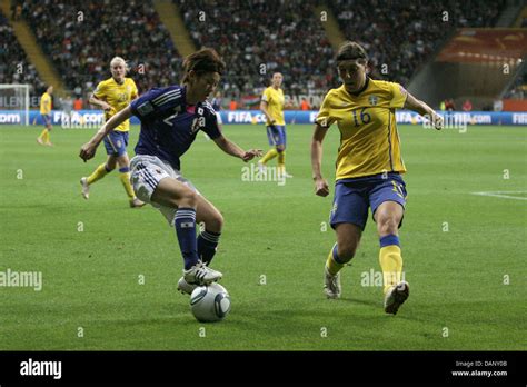 Japans Yukari Kinga L And Swedens Linda Forsberg Vie For The Ball