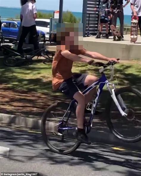 Adelaide Drivers Laugh As Cyclist Falls Over In The Middle Of The Road