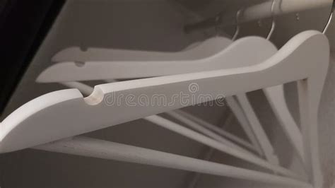 Empty White Hangers in Closet, Background Product Photo Stock Photo ...