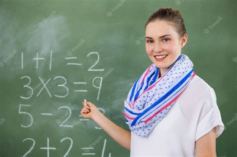 Premium Photo Portrait Of Teacher Teaching Mathematics In Classroom