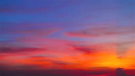 colorful sunset blue red orange yellow sky  orange cloud