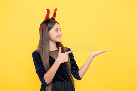 Happy Witch Teenage Devil Girl Pointing Finger On Copy Space Wear Imp