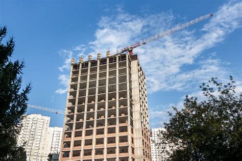 Builders Build a Red Brick Building Facade of a Modern Building Stock ...