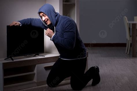 Burglar Thief Stealing Tv From Apartment House Photo Background And