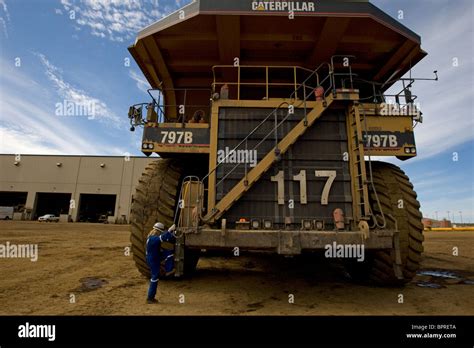 400 ton truck and driver, Albian Sands Oil Sands Mine, Fort McMurray ...