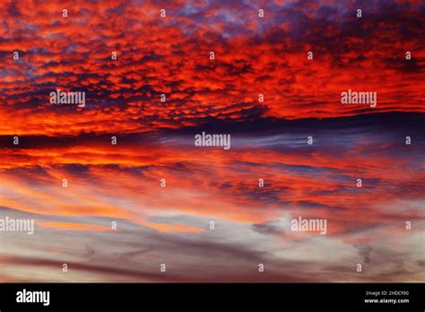 Amazing Dramatic Sunset Sky with Red Clouds Stock Photo - Alamy