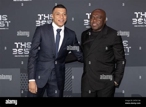 Kylian Mbappe of PSG and his father Wilfried Mbappe arrive at the Best ...