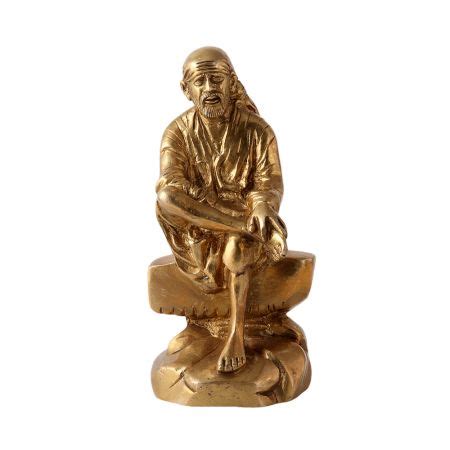 Brass Statue Of Shri Sai Baba Sitting On Stone