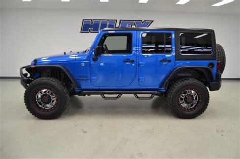 Lifted Jeep Wrangler Unlimited in Hydro Blue. I am not mad at it! | Blue jeep, Jeep wrangler ...