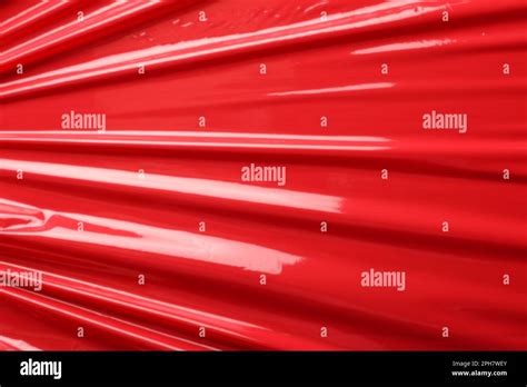 red plastic stretch wrap  background closeup stock photo alamy